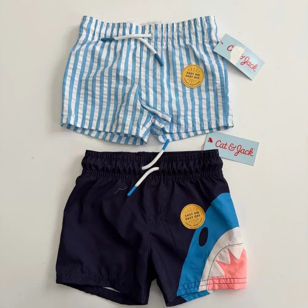 2x Cat & Jack swim trunks navy blue shark light blue and white vertical stripe